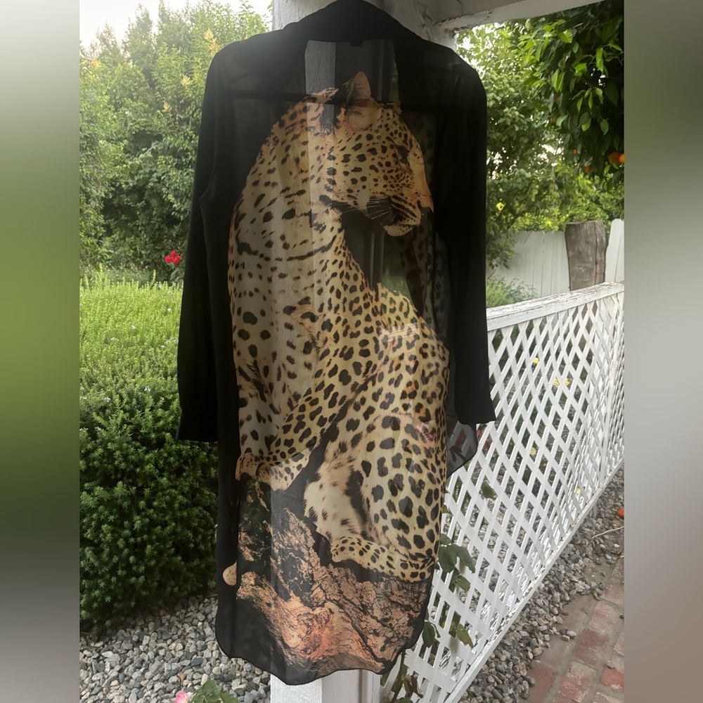 Forever 21 long sleeve sheer blouse with tiger back slightly longer in the back
